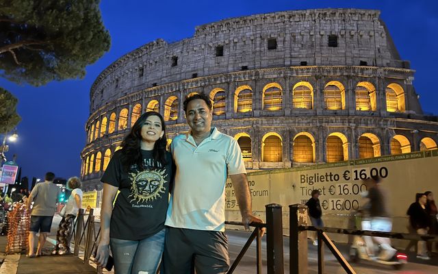 Saif Rehman with family outside the Colosseum in Rome at night